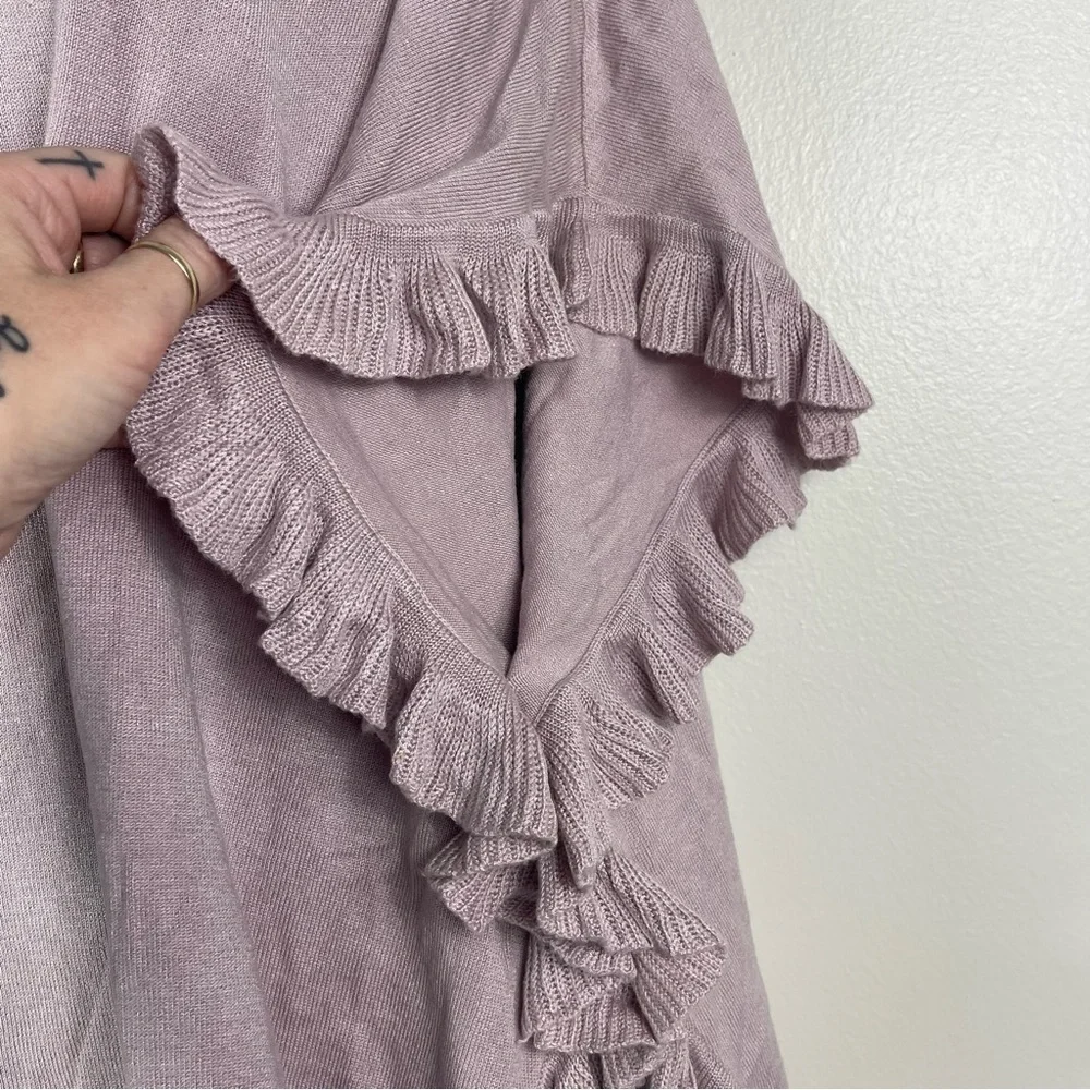 Joseph A turtleneck poncho with ruffled trim